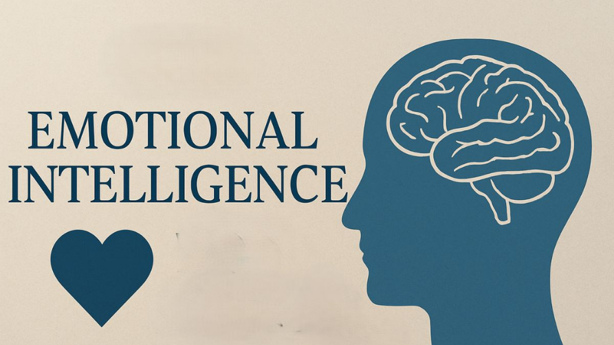 An illustration featuring the words "EMOTIONAL INTELLIGENCE" in large dark blue text. Below the text is a solid dark blue heart, and to the right is a dark blue silhouette of a human head in profile containing a line drawing of a brain, all set against a light beige background.